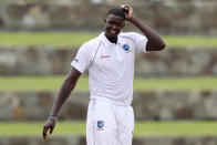 West Indies' captain Jason Holder scratches his head during day one of the first Test cricket match against India at the Sir Vivian Richards cricket ground in North Sound, Antigua and Barbuda, Thursday, Aug. 22, 2019. (AP Photo/Ricardo Mazalan)