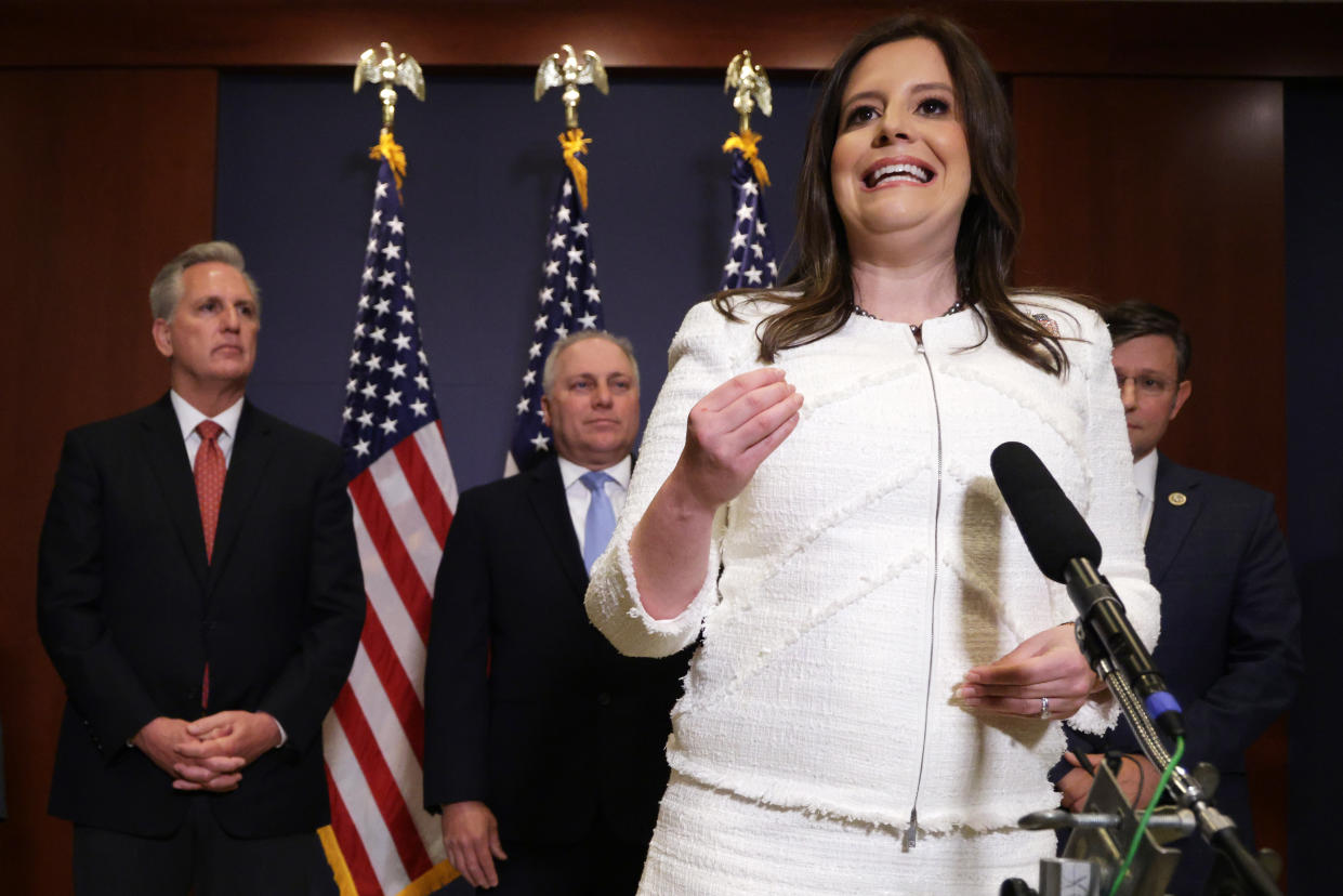 U.S. Rep. Elise Stefanik (R-NY) (3rd L) speaks to members of the press after an election for House Republican Conference chair as (L-R) House Minority Leader Rep. Kevin McCarthy (R-CA), House Minority Whip Rep. Steve Scalise (R-LA), and the newly elected House Republican Conference Vice Chair Rep. Mike Johnson (R-LA) listen at the U.S. Capitol Visitor Center May 14, 2021 on Capitol Hill in Washington, DC. (Alex Wong/Getty Images)