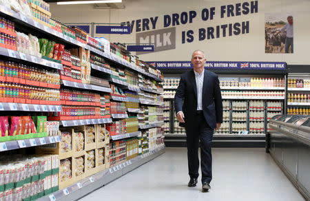 Dave Lewis, Chief Executive Officer of Tesco walks inside one of Tesco's new discount supermarkets called Jack's, in Chatteris, Britain, September 19, 2018. REUTERS/Chris Radburn