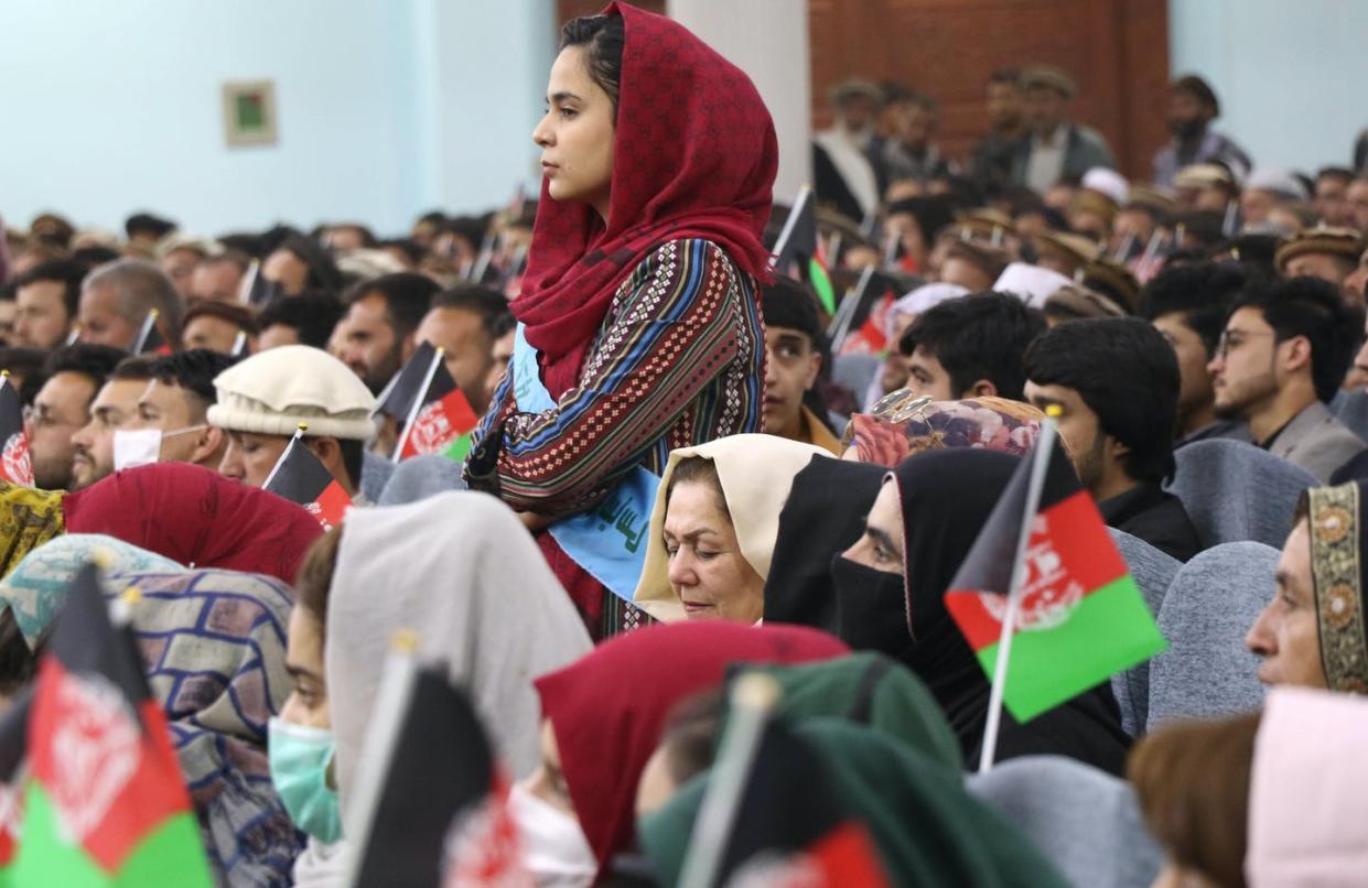 <span class="caption">Afghan citizens at a March 2021 rally in Kabul to support peace talks between the Taliban and the government. </span> <span class="attribution"><a class="link " href="https://www.gettyimages.com/detail/news-photo/afghan-women-youths-activists-and-elders-gather-at-a-rally-news-photo/1232002648" rel="nofollow noopener" target="_blank" data-ylk="slk:Haroon Sabawoon/Anadolu Agency via Getty Images;elm:context_link;itc:0;sec:content-canvas">Haroon Sabawoon/Anadolu Agency via Getty Images</a></span>
