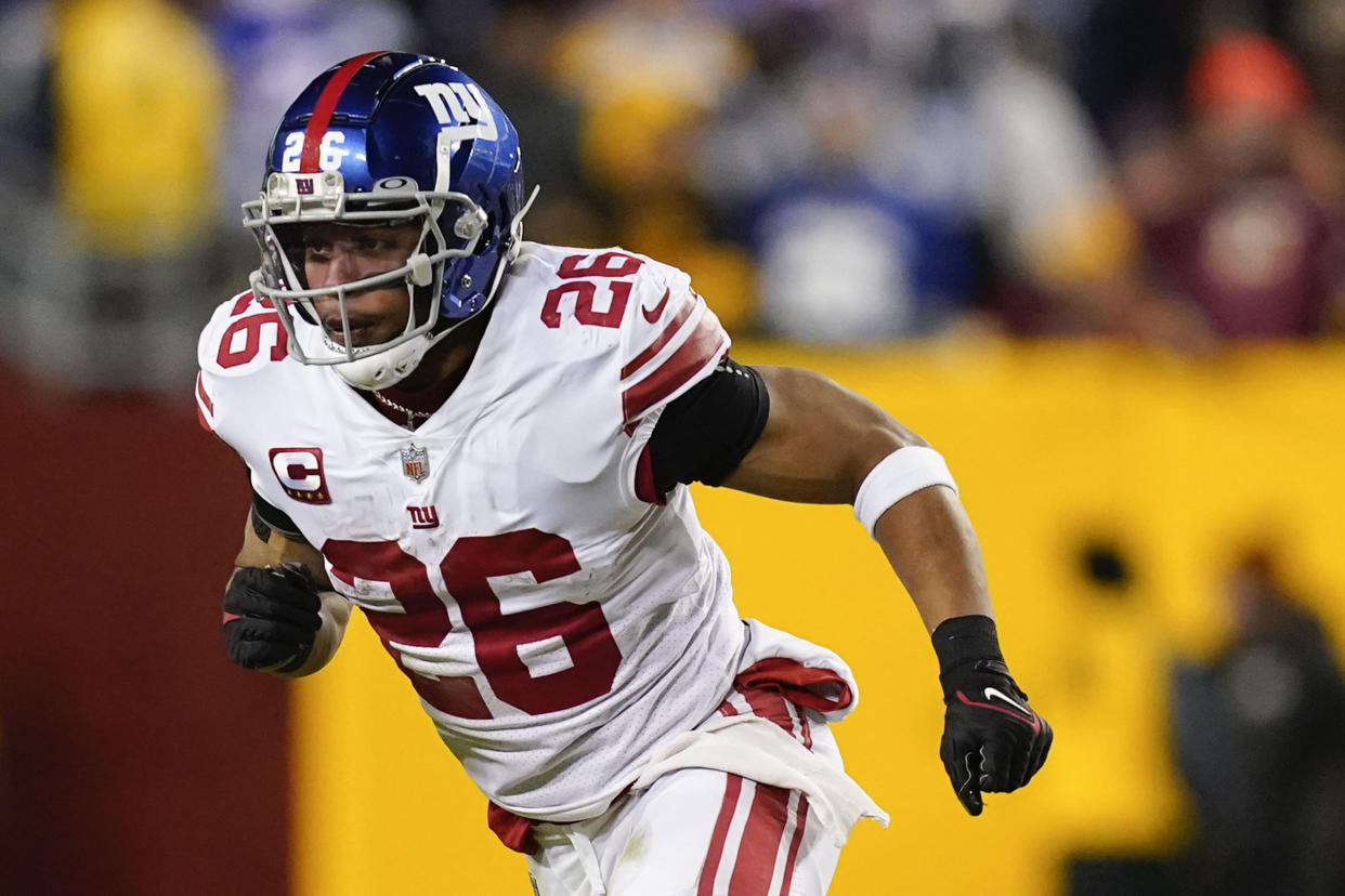 Saquon Barkley and the Giants are trying to strengthen their hold on an NFC playoff spot on NFL Christmas Eve against the Vikings. (AP Photo/Patrick Semansky)