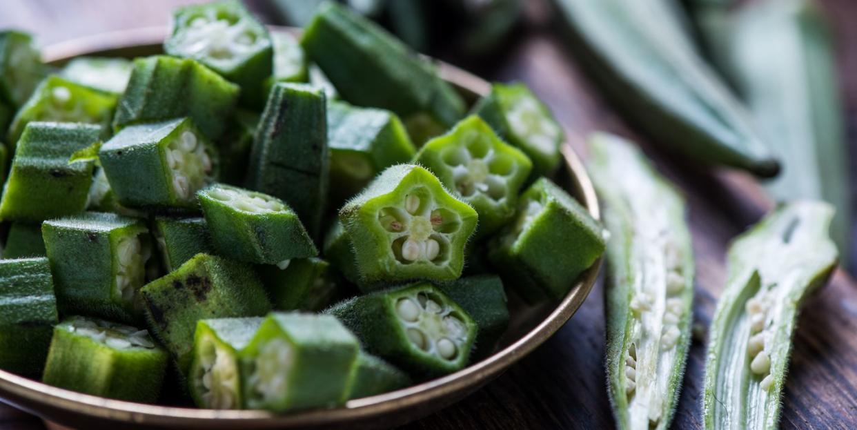 farm fresh okra on wooden board