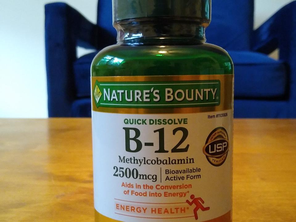 green and white bottle of b-12 pills from costco