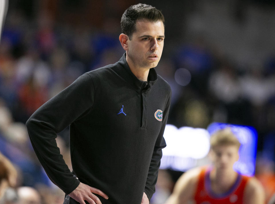 Florida head coach Todd Golden watches during the first half of an NCAA college basketball game against Vanderbilt, Saturday, Feb. 24, 2024, in Gainesville, Fla. (AP Photo/Alan Youngblood)