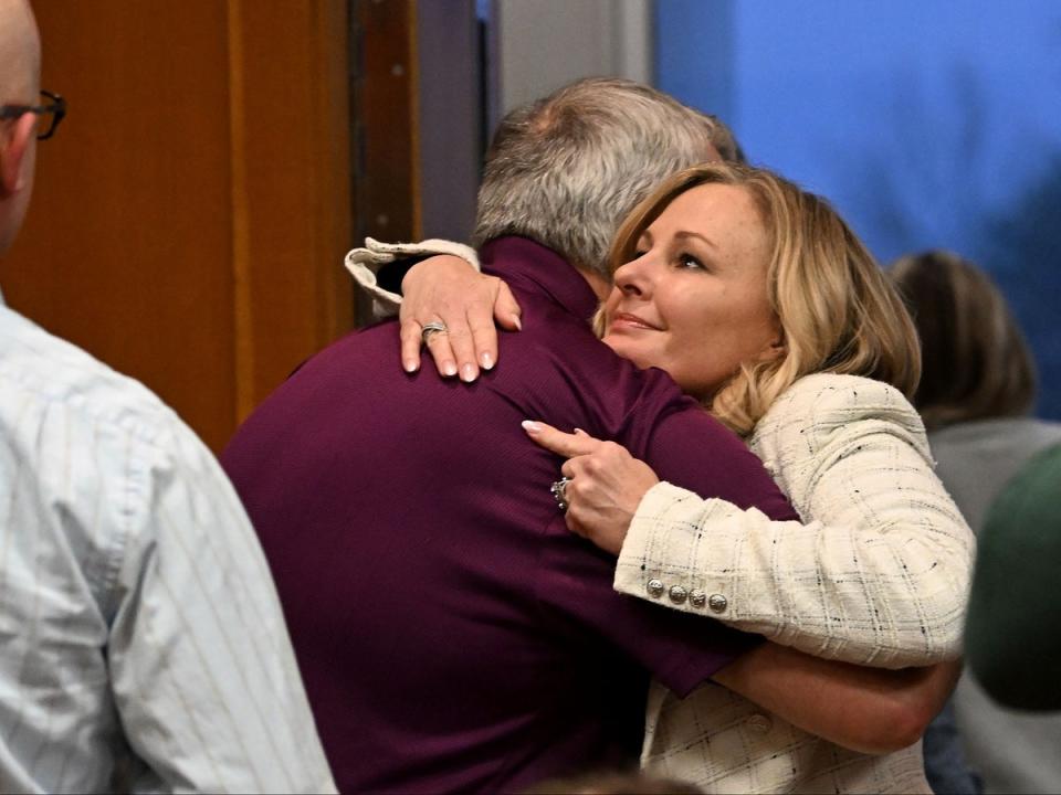 Oakland County prosecutor Karen McDonald hugs Steve St. Juliana, father of Oxford High School shooting victim Hana St. Juliana (AP)