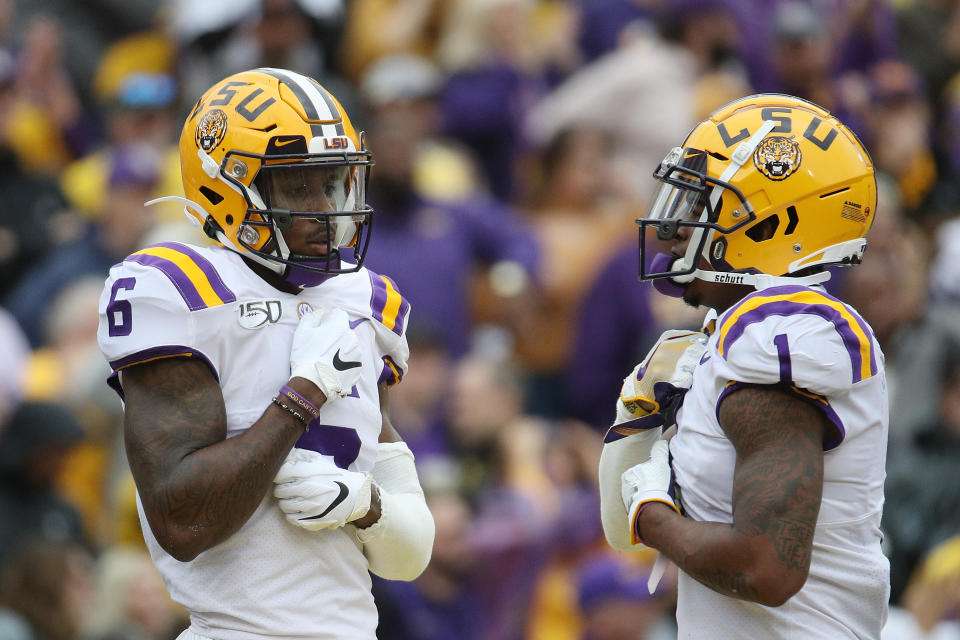 LSU WRs Terrace Marshall Jr., left, and Ja'Marr Chase, right, could be the Tigers' latest first-round picks in 2021. (Photo by Chris Graythen/Getty Images)