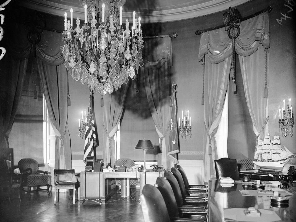 A black and white photo of the Blue Room of the White House in 1934