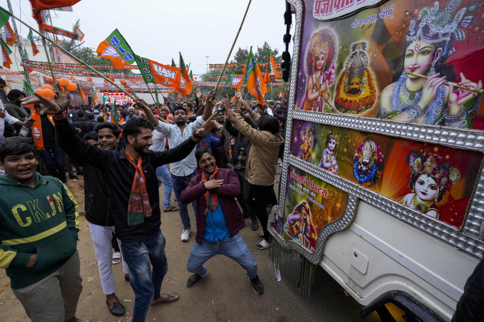 Supporters of India's ruling Bharatiya Janata Party, or BJP, celebrate early leads for the party in Rajasthan state elections in Jaipur, India, Sunday, Dec.3, 2023. Vote counting began Sunday in four Indian states in a test of strength for India's opposition pitted against the ruling party of Prime Minister Narendra Modi ahead of next year's crucial national vote. (AP Photo/Deepak Sharma)