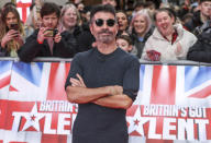 <p>Simon Cowell poses on the red carpet for a <i>Britain's Got Talent</i> photocall on Jan. 27 at the London Palladium.</p>