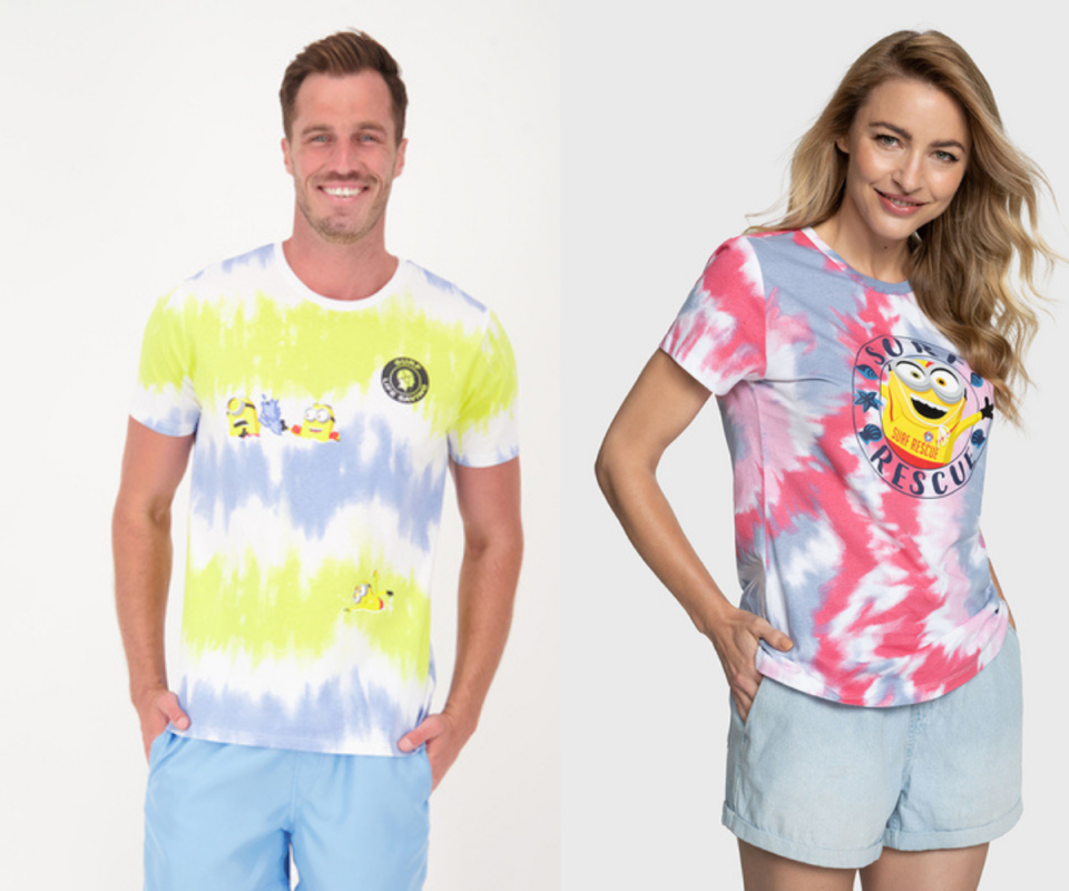 On the left, a caucasian man wears a blue and yellow tie-dyed t-shirt with two small minions on the top left, while a blonde caucasian woman stands on the right with a pink, mave, red and white tie-dye t-shirt with a minion on the front with Surf Rescue written in a blue circle around it. Both images against a white background.