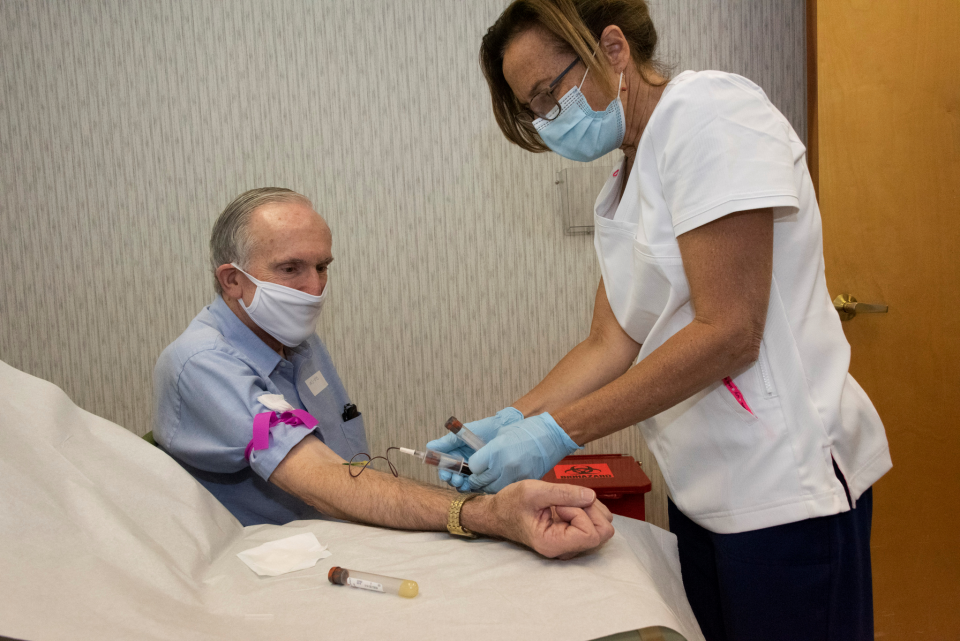 Volunteers such as Raymond Grosswirth are participating in a Phase 3 clinical trial for a possible COVID-19 vaccine.