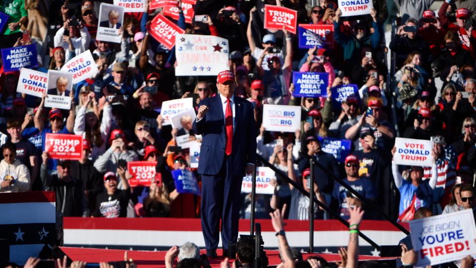 Donald Trump enters the stage as Trump holds a rally on the beach in Wildwood, NJ on Saturday, May 11, 2024.