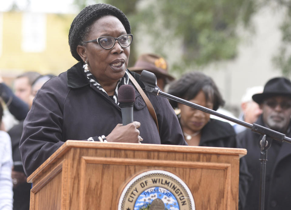 Deborah Dicks Maxwell, President of the New Hanover County NAACP, speaks during a dedication ceremony for a new North Carolina highway historical marker to the 1898 Wilmington Coup in Wilmington, N.C., Friday, Nov. 8, 2019. The marker stands outside the Wilmington Light Infantry building, the location where in 1898, white Democrats violently overthrew the fusion government of legitimately elected blacks and white Republicans in Wilmington. (Matt Born/The Star-News via AP)