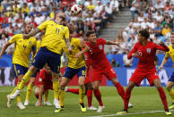 <p>Sweden’s John Guidetti heads the ball ino the danger area </p>