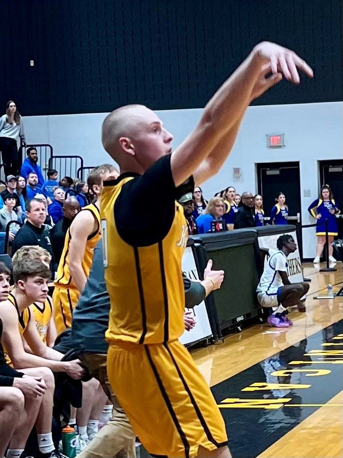 Northmor's Grant Bentley takes a shot during a Division IV boys basketball district final at Ohio Dominican this season. He earned first-team All-Ohio honors by the OPSWA this year.