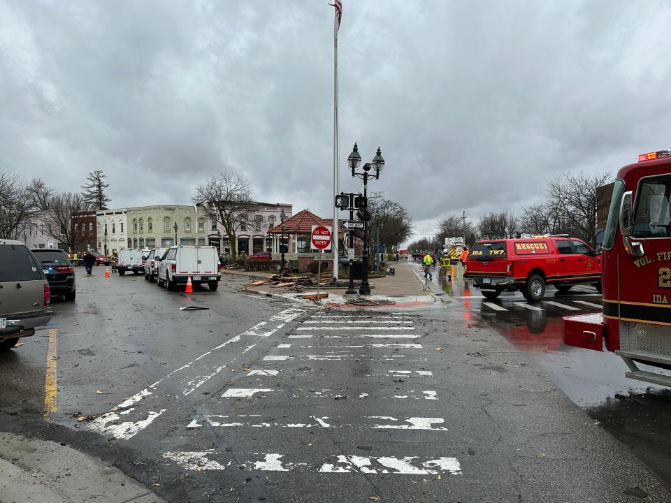 Emergency personnel had downtown Dundee blocked off Saturday morning, April 1, 2023, after a severe thunderstorm caused severe building damage.