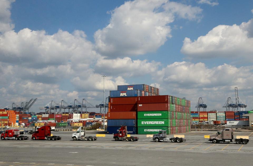 Trucks line up around tall stacks of containers at the Georgia Ports Authority in this photo from 2021.