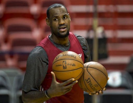 Miami Heat player LeBron James attends a practice at the American Airlines Arena in Miami, Florida. The National Basketball Association finals are a battle of attrition, and no team understands this better than the Miami Heat