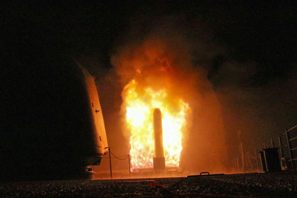 <em>The guided-missile cruiser USS Monterey fires a Tomahawk land attack missile as part of the Syria air strikes (AP)</em>