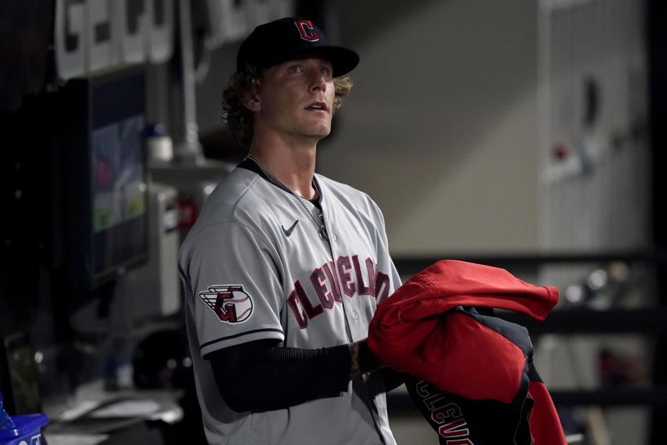 Cleveland Guardians starting pitcher Zach Plesac looks out from the dugout after being pulled in the seventh inning of a baseball game against the Chicago White Sox Monday, May 9, 2022, in Chicago. (AP Photo/Charles Rex Arbogast)