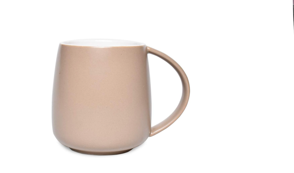 <p><a href="https://www.amazon.com/Bosmarlin-Ceramic-Coffee-Dishwasher-Microwave/dp/B07YS7FK3P/ref=sr_1_2?crid=HCMNQT069TY0&keywords=light+brown+mug&qid=1686689913&s=home-garden&sprefix=light+brown+mug%2Cgarden%2C169&sr=1-2&tag=syn-yahoo-20&ascsubtag=%5Bartid%7C2164.a.44178457%5Bsrc%7Cyahoo-us" rel="nofollow noopener" target="_blank" data-ylk="slk:Shop Now;elm:context_link;itc:0;sec:content-canvas" class="link ">Shop Now</a></p><p>Brown Ceramic Mug</p><p>amazon.com</p><p>$10.99</p>