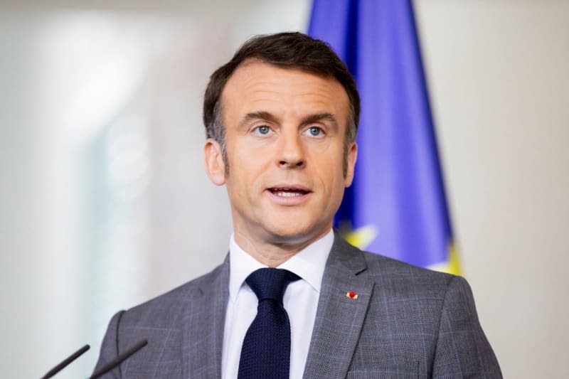 French President Emmanuel Macron speaks during a press statement with German Chancellor Olaf Scholz and Polish Prime Minister Donald Tusk (Not Pictured) after the so-called Weimar Triangle meeting. Christoph Soeder/dpa