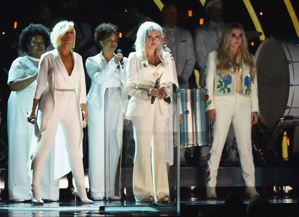 <p>Bebe Rexha (second from left), Cyndi Lauper (center), and Kesha (right) perform onstage during the 60th Annual Grammy Awards at Madison Square Garden on January 28, 2018, in New York City. (Photo: Getty Images) </p>