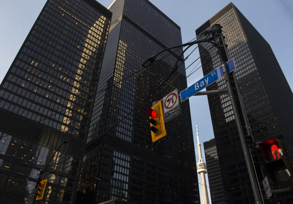 Bay Street in Canada's financial district is shown in Toronto on Wednesday, March 18, 2020. A report by a climate advocacy group shows that some Canadian banks are pulling ahead of others on climate policy now that they've all laid out their initial net-zero plans.THE CANADIAN PRESS/Nathan Denette