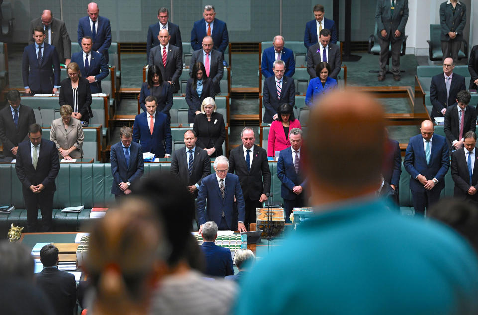 <p>Australian Parliamentarians stand for a minute of silence honouring the people killed and wounded in an explosion in the English city of Manchester, during Question Time in the House of Representatives at Parliament House in Canberra, Australia on May 23, 2017. (AAP/Lukas Coch/via Reuters) </p>