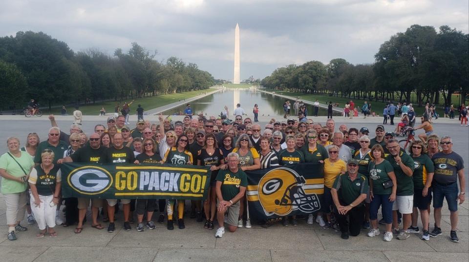 A group of over 100 Packers fans local to Sheboygan pose in Washington D.C. on one of Dan "Bogie" Bogenschuetz's trips.