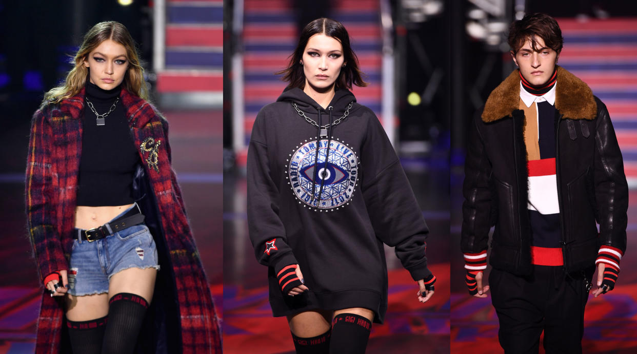 Gigi, Bella, and Anwar Hadid at the Tommy Hilfiger show in London during LFW. (Photo: Getty Images)