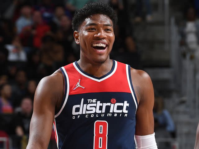 <p>Chris Schwegler/NBAE/Getty </p> Rui Hachimura #8 of the Washington Wizards smiles against the Detroit Pistons on March 25, 2022.