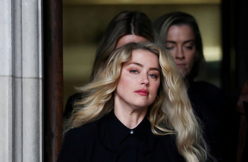 FILE PHOTO: Actors Johnny Depp and Amber Heard at the High Court in London