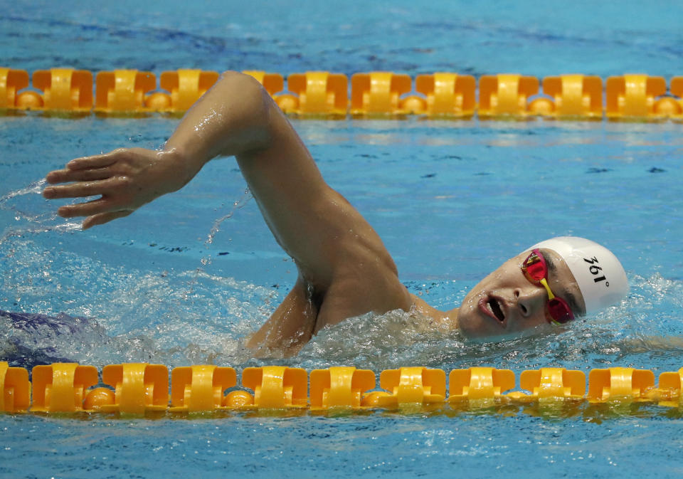 China's Sun Yang swims during a training session at the World Swimming Championships in Gwangju, South Korea, Friday, July 19, 2019. (AP Photo/Lee Jin-man)