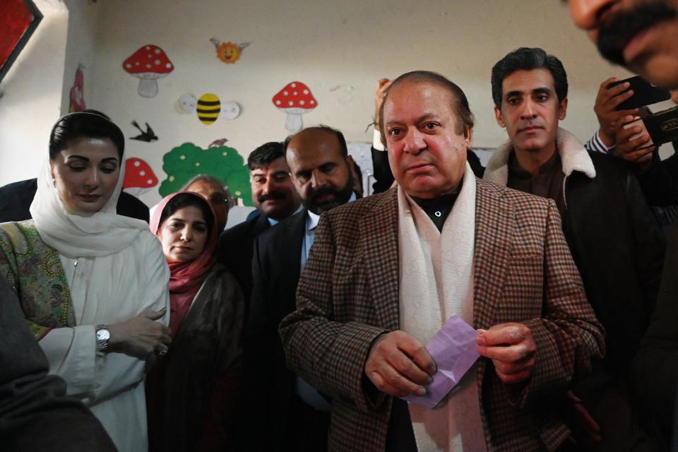 Nawaz Sharif looks on as he reaches polling station in his constituency in Lahore (AFP via Getty Images)