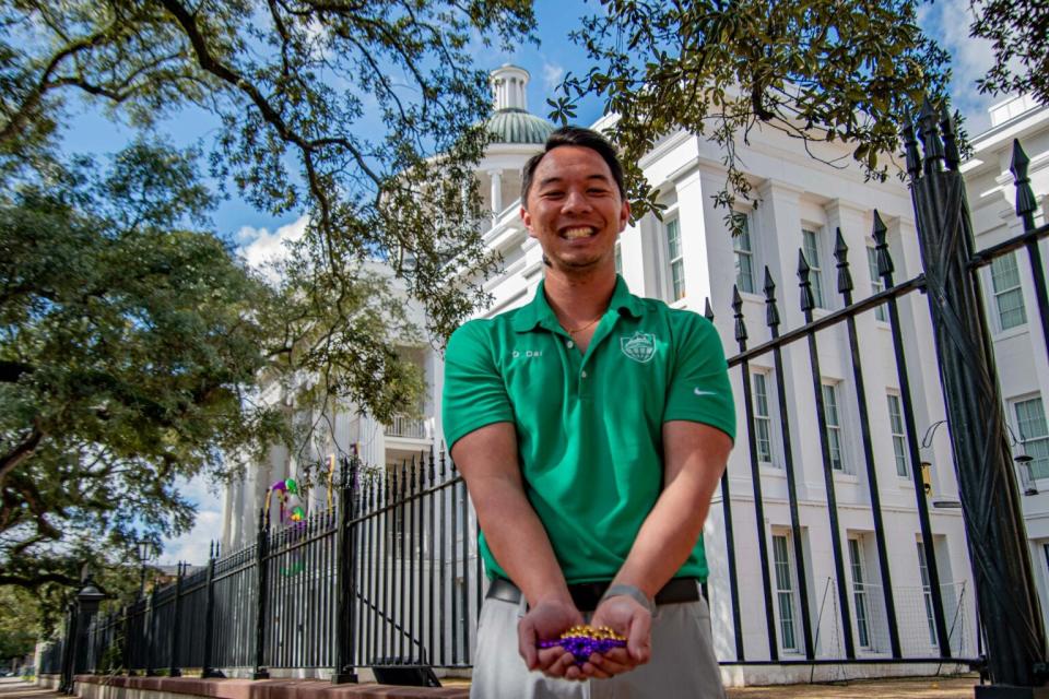 David Dai stands outside Barton Academy in Mobile.