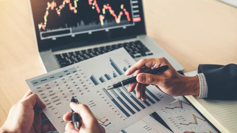 Business Team Investment Entrepreneur Trading discussing and analysis graph stock market trading,stock chart concept.