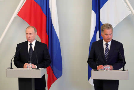 Russian President Vladimir Putin (L) and Finnish President Sauli Niinisto attend a joint news conference at the Hotel Punkaharju in Savonlinna, Finland, July 27, 2017. Sputnik/Mikhail Klimentyev/Kremlin via REUTERS