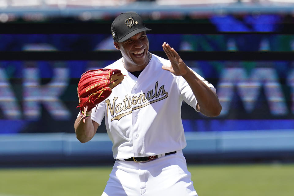 National League outfielder Juan Soto, of the Washington Nationals, reacts during batting practice prior to the MLB All-Star baseball game, Tuesday, July 19, 2022, in Los Angeles. (AP Photo/Abbie Parr)