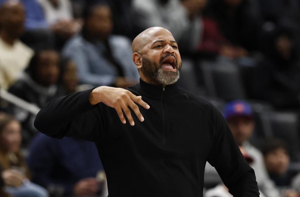 Cleveland Cavaliers coach J.B. Bickerstaff shouts to players during the first half of the team's NBA basketball game against the Detroit Pistons on Saturday, Dec. 2, 2023, in Detroit. (AP Photo/Duane Burleson)