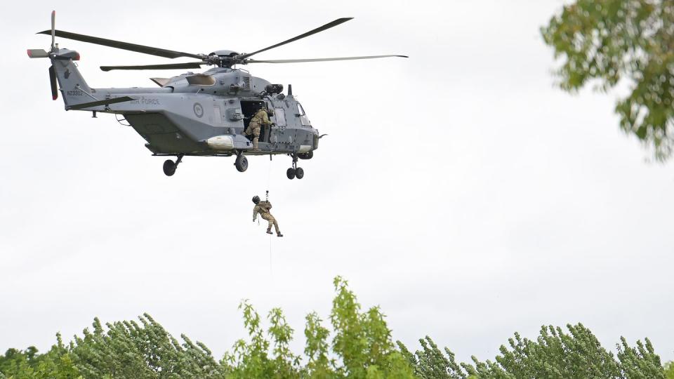 A Royal New Zealand Air Force NH90 helicopter conducts operations in the country's community of Puketapu on Feb. 16, 2023. (Kerry Marshall/Getty Images)