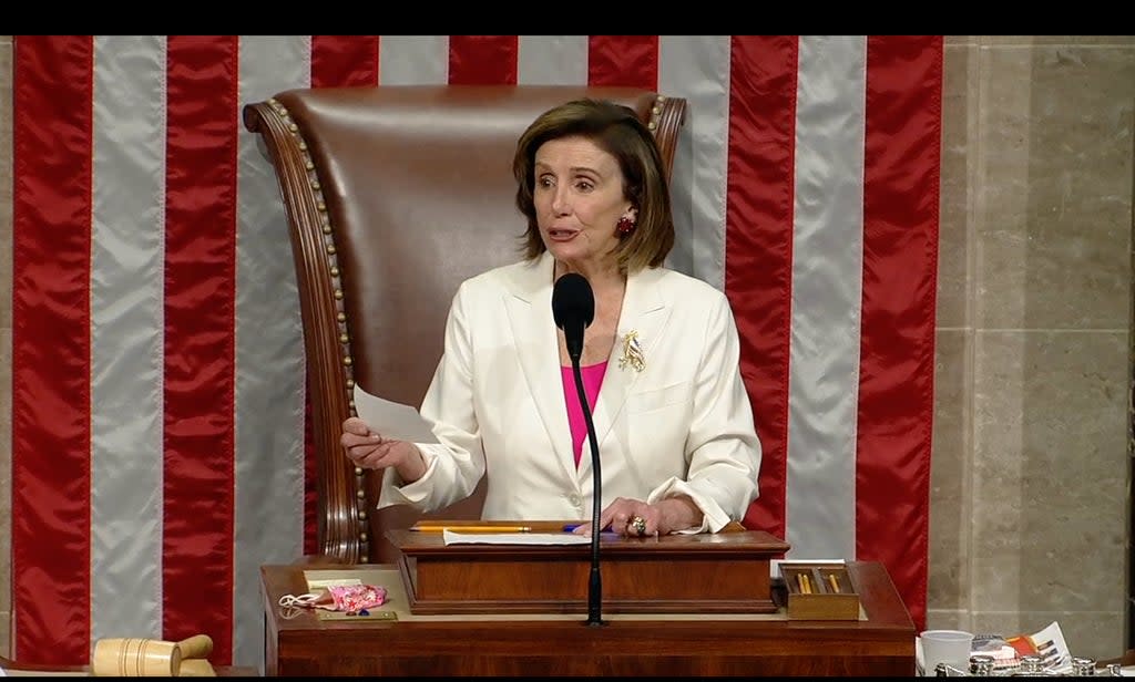 House Speaker Nancy Pelosi reads the results of the roll call vote to pass the Build Back Better Act (US Government livestream)