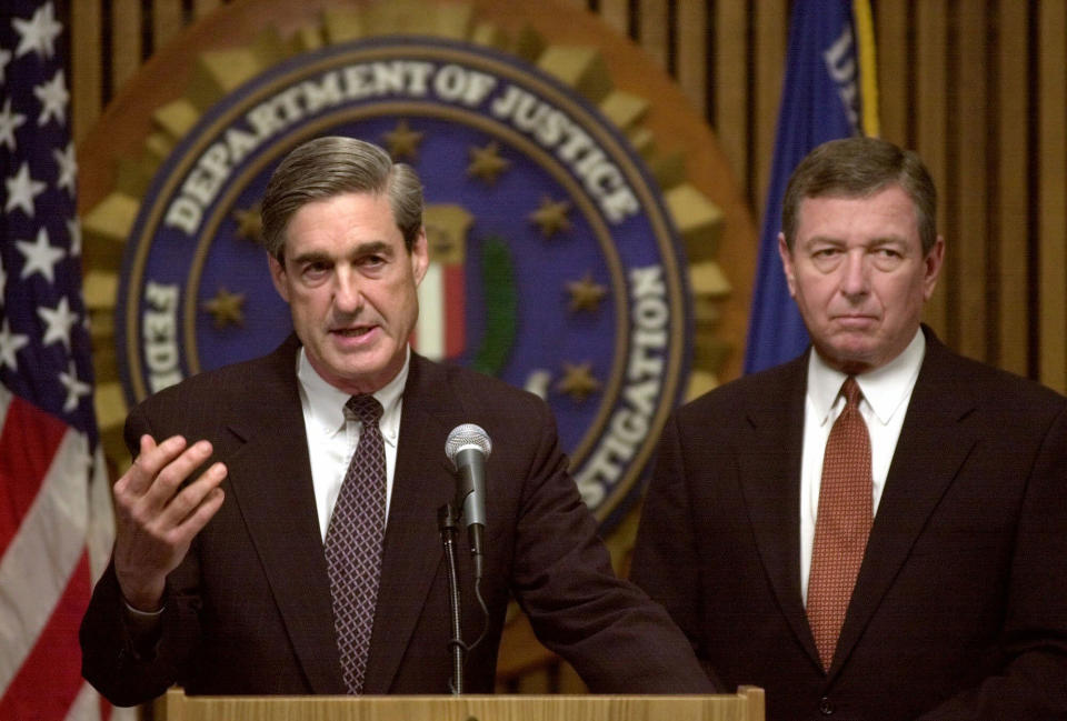 <p>FBI Director Robert Mueller, left, accompanied by Attorney General John Ashcroft, meet with reporters at FBI headquarters in Washington, Thursday, Sept. 13, 2001, to discuss the investigation of the terrorist attacks. (Photo: Susan Walsh/AP) </p>