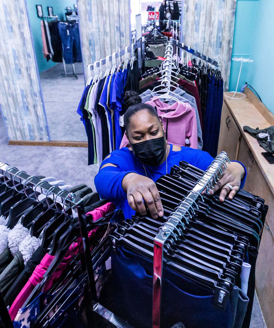 Owner Andrea Skys, of SistaSista Clothing and Jewelry, organizes inventory in her former South Milwaukee location at 2412 10th Ave., South Milwaukee on Tuesday, Jan. 19, 2021.