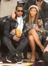 <p>The couple sat arm in arm watching the NBA all star game in Phoenix, Arizona.</p>