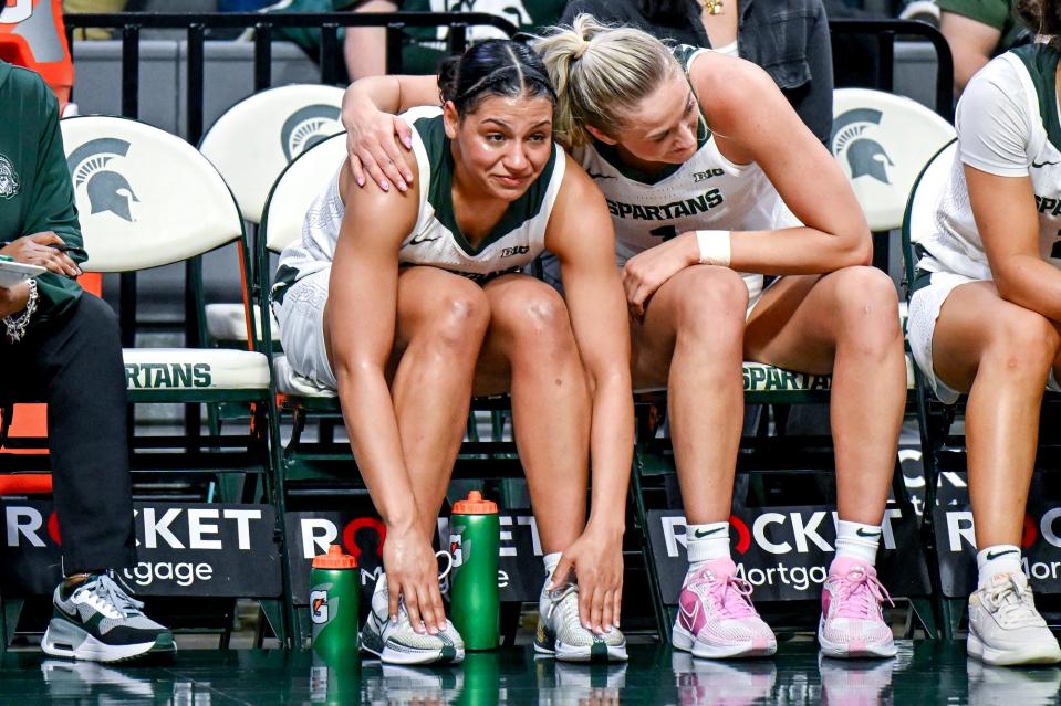 Michigan State seniors Moira Joiner, left, and Tory Ozment hug on the bench in the game against Illinois during the fourth quarter on Thursday, Feb. 29, 2024, at the Breslin Center in East Lansing.