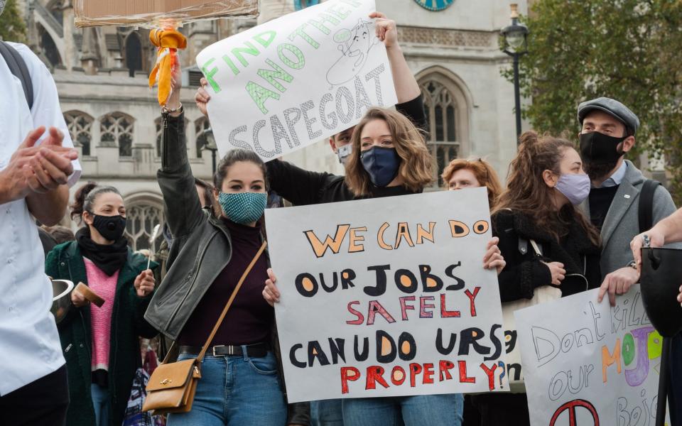 Protesters at the Hospitality demonstration on Monday morning, held at Parliament Square -  Barcroft Media