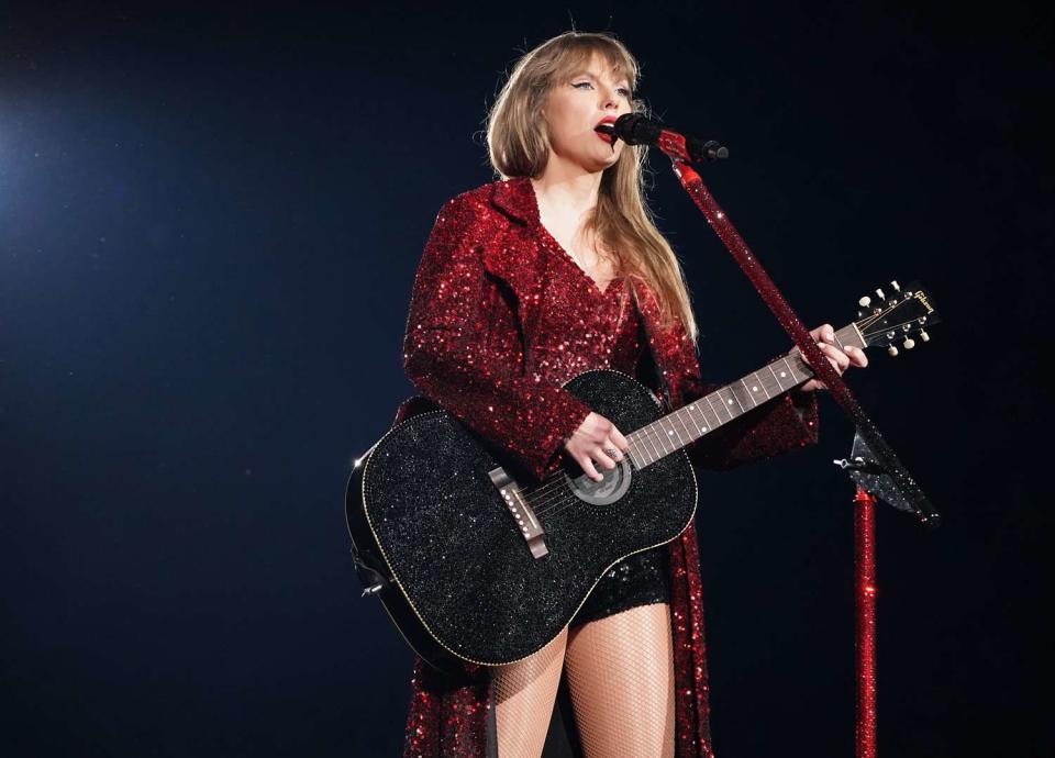 <p>Christopher Jue/TAS24/Getty</p> Taylor Swift performs in Tokyo, japan on Feb. 7, 2024