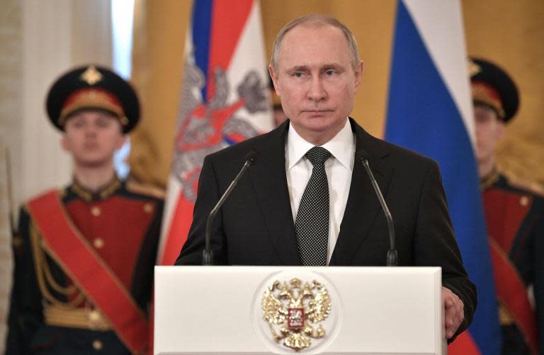 Russia election - latest updates: Putin looks set to tighten grip on power as international turmoil continues