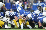 Indianapolis Colts quarterback Matt Ryan (2) dives for a first down during the second half of an NFL football game against the Pittsburgh Steelers, Monday, Nov. 28, 2022, in Indianapolis. (AP Photo/Michael Conroy)